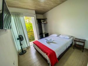 Voodi või voodid majutusasutuse Aparta-Hotel LENEMBERGER toas