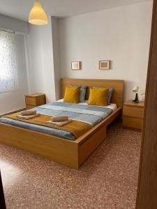 Een bed of bedden in een kamer bij UIM Mediterraneo Isabel 23 Wifi
