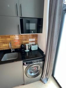 Kuchyňa alebo kuchynka v ubytovaní Vip Apartments Valencia