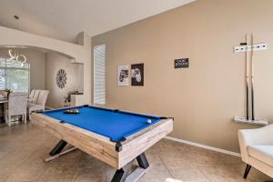 a pool table in a living room with at New Home Hot Tub, Grill, Games, 11 Mi to Strip! in Las Vegas