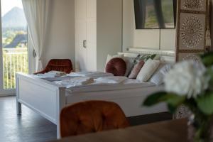 Postel nebo postele na pokoji v ubytování Rooms21 + 106 fotografií