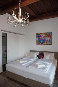 Posteľ alebo postele v izbe v ubytovaní Rooms21