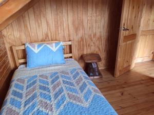 Postel nebo postele na pokoji v ubytování Cabaña piedra azul