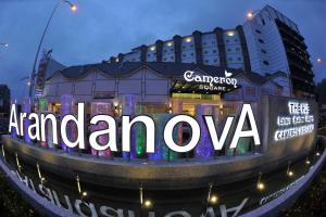a sign that reads amazonazonova in front of a building at Nova Highlands Hotel in Cameron Highlands