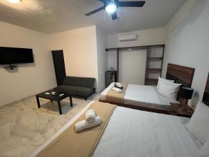 Postel nebo postele na pokoji v ubytování BALAM Playa - 15Th Ave + 85 fotografií