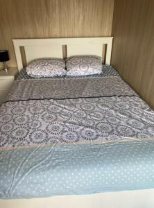 Posteľ alebo postele v izbe v ubytovaní Gîte atypique en bois entre ville et verdures
