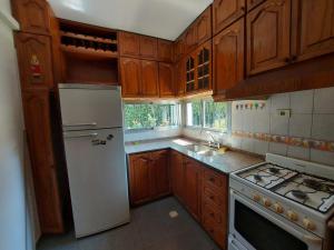 Køkken eller tekøkken på Casa hermosa cómoda en barrio tranquilo