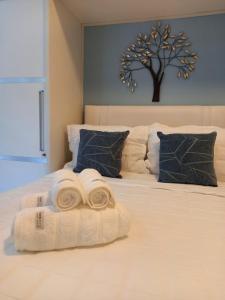 EXCLUSIVO 100m Praia Copacabana - 2qts - Varanda - Hidro - Maison Copa Prime房間的床