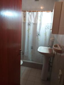 a bathroom with a shower and a sink at Casa sur 3 (faro norte) in Mar del Plata