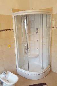 a bathroom with a shower with a sink and a toilet at Apartments with a parking space Selce, Crikvenica - 5475 in Selce