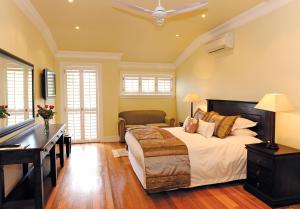 Ένα ή περισσότερα κρεβάτια σε δωμάτιο στο Sica's Guest House - The Loft