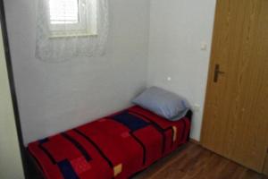 Posteľ alebo postele v izbe v ubytovaní Apartment Novi Vinodolski 5479c