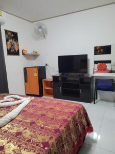 TV a/nebo společenská místnost v ubytování B&B NAMO PHUKET