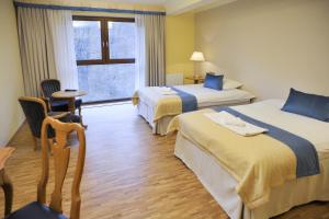 Łóżko lub łóżka w pokoju w obiekcie Hotel Mir-Jan SPA