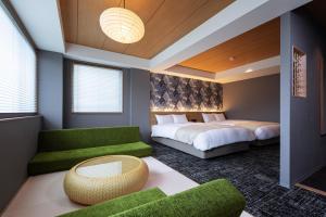 Voodi või voodid majutusasutuse Rinn Gion Shirakawa toas