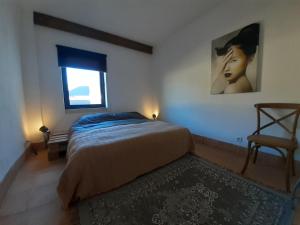 Postel nebo postele na pokoji v ubytování Cozy Corner Apartment Villa O Sonho