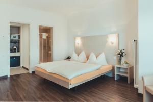 Posteľ alebo postele v izbe v ubytovaní Hotel Tobler