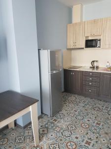 Kjøkken eller kjøkkenkrok på Apartment Lotos Batumi 72