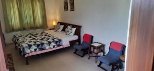 Letto o letti in una camera di Rawla Rawatsar