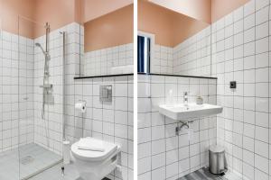 La salle de bains est pourvue de toilettes et d'un lavabo. dans l'établissement Forenom Aparthotel Malmö Varvsstaden, à Malmö