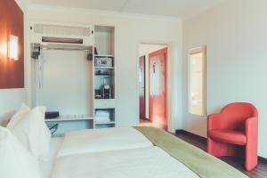 Posteľ alebo postele v izbe v ubytovaní Hotel Tobler
