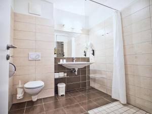 Ένα μπάνιο στο Grafenberg Resort by Alpeffect Hotels