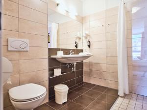 Ένα μπάνιο στο Grafenberg Resort by Alpeffect Hotels