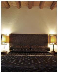 Cama ou camas em um quarto em Casa Magnani