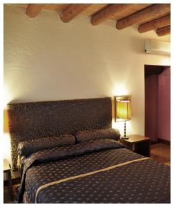 Ліжко або ліжка в номері Casa Magnani