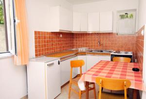 Kuchyň nebo kuchyňský kout v ubytování Apartment Novi Vinodolski 5587c + 16 fotografií