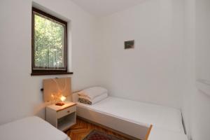 En eller flere senge i et værelse på Apartments with WiFi Selce, Crikvenica - 5565