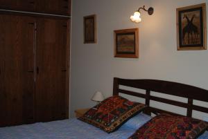 A bed or beds in a room at Casa Rural Rincon de la Vega