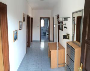a hallway of a house with white walls at Apartments with a parking space Dramalj, Crikvenica - 5576 in Dramalj