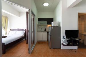 Kuchyň nebo kuchyňský kout v ubytování Avatara A condominium B61 with sea view
