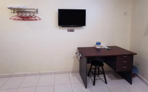 TV a/nebo společenská místnost v ubytování Hotel Bandar Baru Menglembu + 8 fotografií