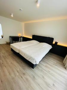 Krevet ili kreveti u jedinici u okviru objekta Hotel Bell-X Kortrijk-Wevelgem