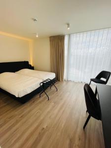 Krevet ili kreveti u jedinici u okviru objekta Hotel Bell-X Kortrijk-Wevelgem