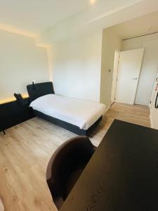 Krevet ili kreveti u jedinici u okviru objekta Hotel Bell-X Kortrijk-Wevelgem