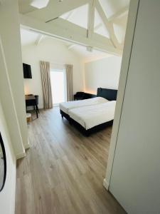 Krevet ili kreveti u jedinici u okviru objekta Hotel Bell-X Kortrijk-Wevelgem