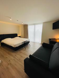 Krevet ili kreveti u jedinici u okviru objekta Hotel Bell-X Kortrijk-Wevelgem