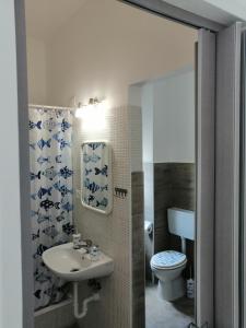 Kúpeľňa v ubytovaní Albergo blue fish