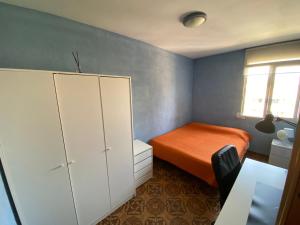 Posteľ alebo postele v izbe v ubytovaní Piso cerca de la playa - Act. Mauri 1B