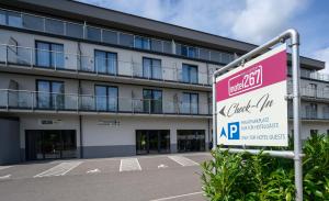 a hotel sign in front of a building at Motel 267 in Sankt Pölten