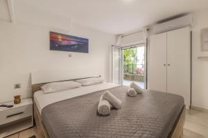 A bed or beds in a room at S&A STUDIO