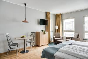 Postel nebo postele na pokoji v ubytování Forenom Aparthotel Lund + 9 fotografií