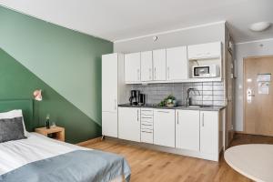 Kuchyň nebo kuchyňský kout v ubytování Forenom Aparthotel Lund