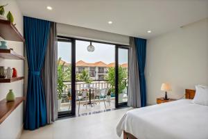 En eller flere senge i et værelse på Green Meadows Boutique Apartments