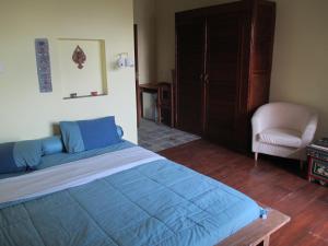 Postel nebo postele na pokoji v ubytování Hotel Swiss