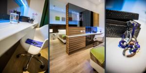 TV a/nebo společenská místnost v ubytování Hotel degli Arcimboldi