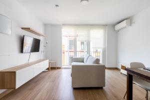 TV a/nebo společenská místnost v ubytování Holi-Rent Pureza
